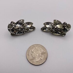 Vintage post rhinestone earrings 
Quarter for size reference